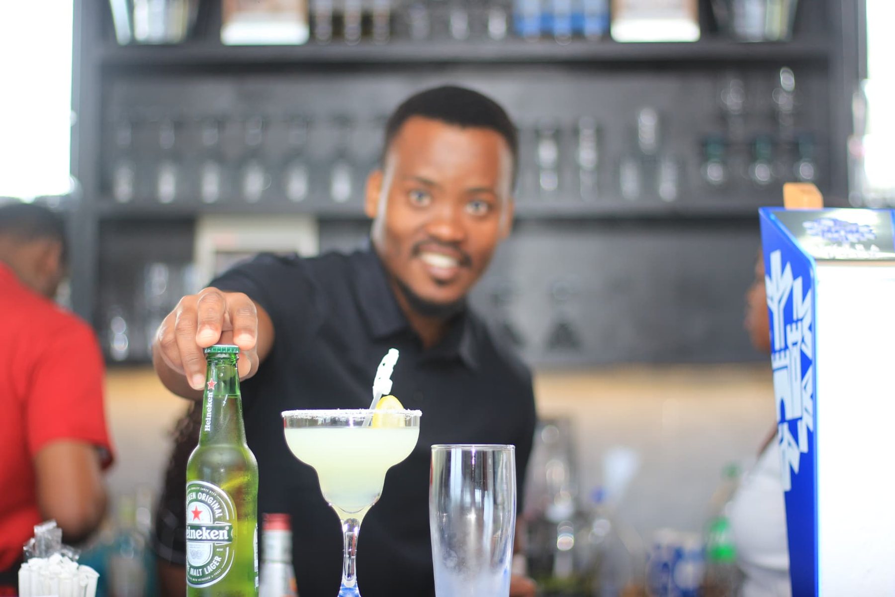 Barman serving drinks at the Sundowner Bar